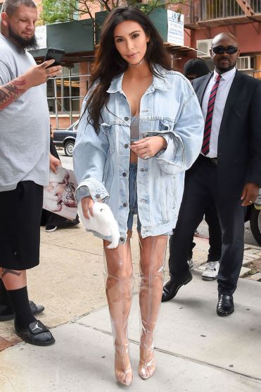 Kim Kardashian wearing Yeezy clear boots